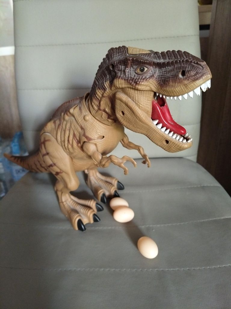 Dinozaur TRex chodzi, świeci, ryczy
