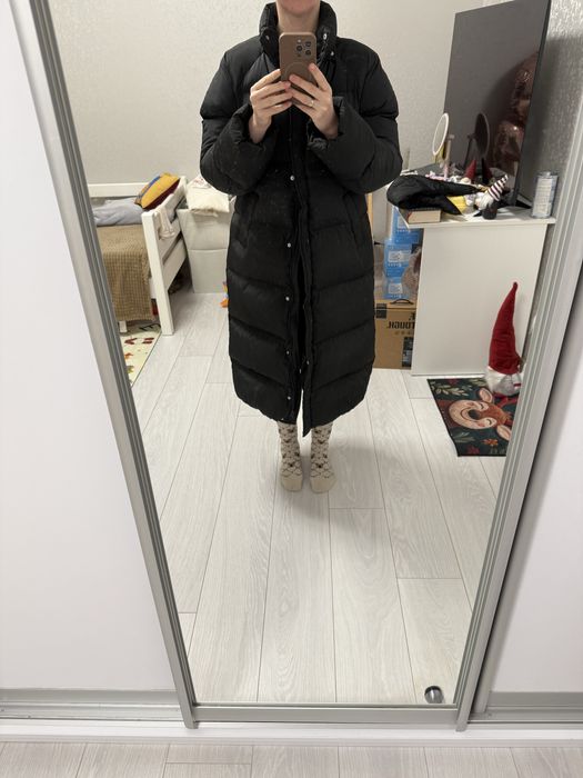 Продам пуховик чорний довгий