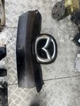 Значок в бампер передний Мазда сх7 mazda cx7