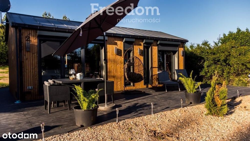 Domek w malowniczej scenerii jezior i lasów. Lutek