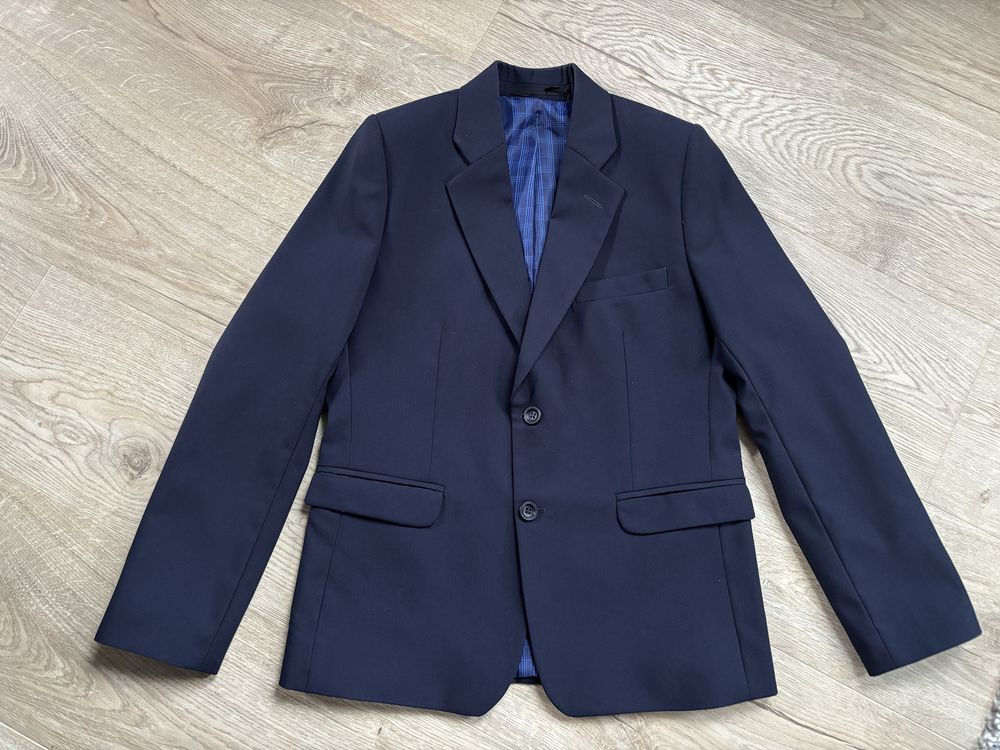 Garnitur komunia rozm 146 slim stan idealny