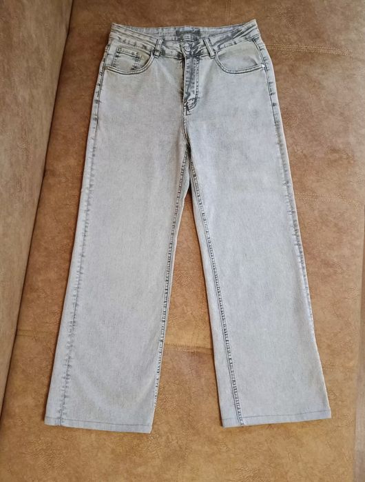 Джинси з ефектом варки,легкий клеш,розмір 31-32