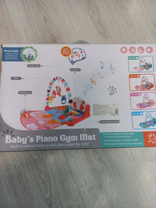 Розвиваючий килимок, музичний
