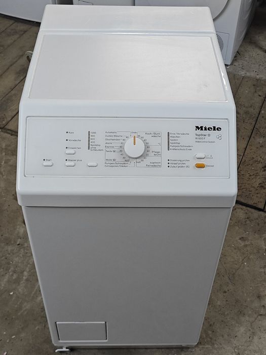 Вертикальна пральна машина Miele TopStar