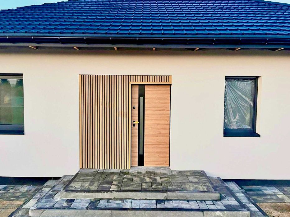 Dom energooszczędny, pompa ciepła, powierzchnia 88 m2, kostka brukowa.