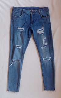 Świetne rurki z przetarciami jeansy dziury 40 M L