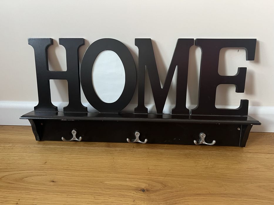 Wieszak marki Home&You, z ramką na zdjęcie