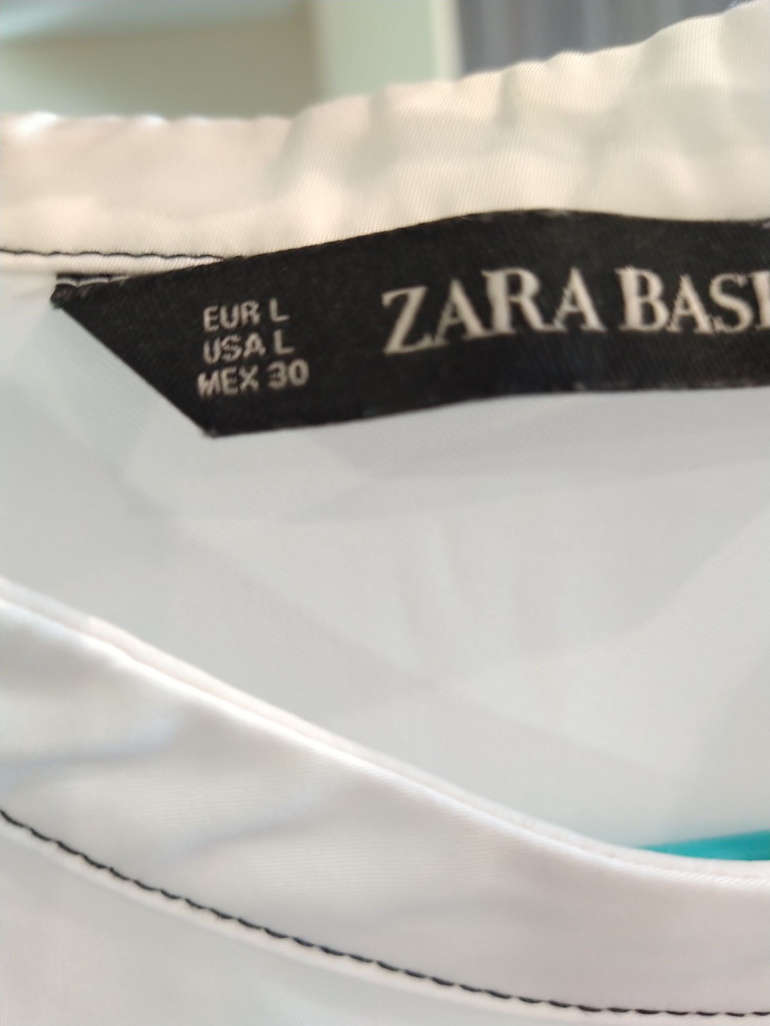 Última preço Blusa com pormenor na gola e nas mangas Zara