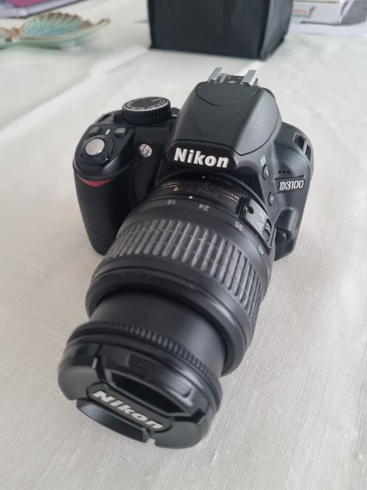 Nikon D3100 + lente Nikon 15-55
