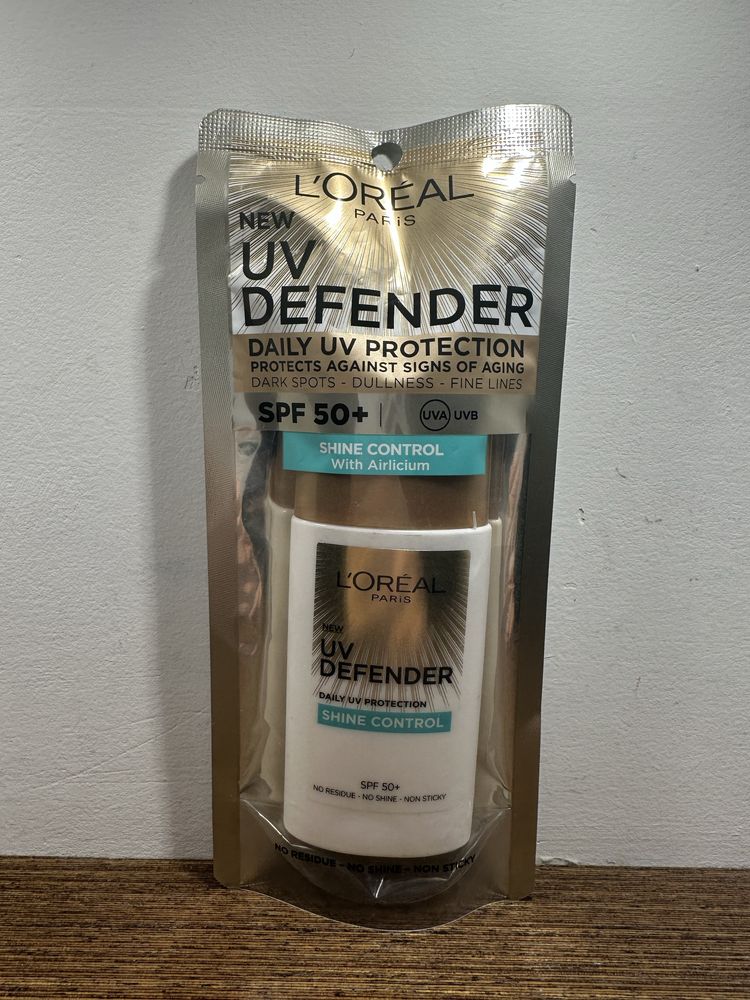 Uv defender daily uv protection shine control spf 50+ l’oréal