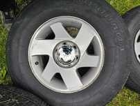 koła 16" l200 Pajero Nissan Opel opony letnie + nowiutkie dekielki