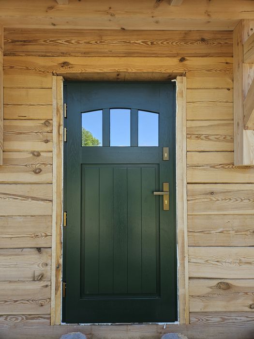 Drzwi zewnętrzne drewniane dębowe ral 3020 z montażem producent