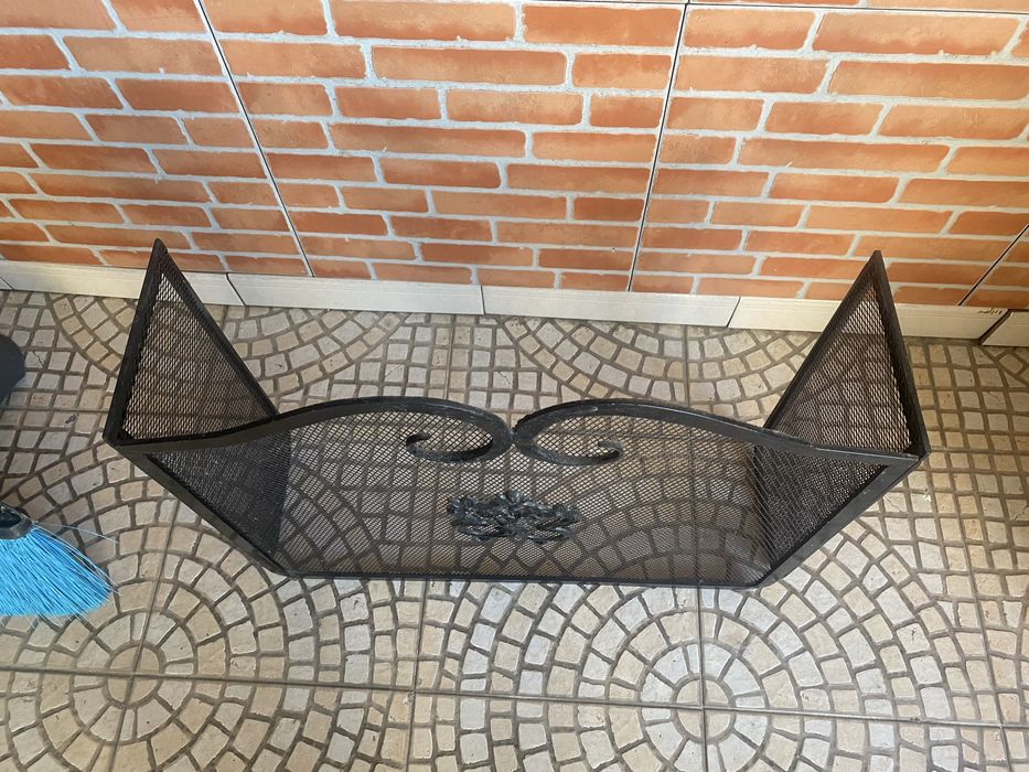 Grelha de protecao lareira