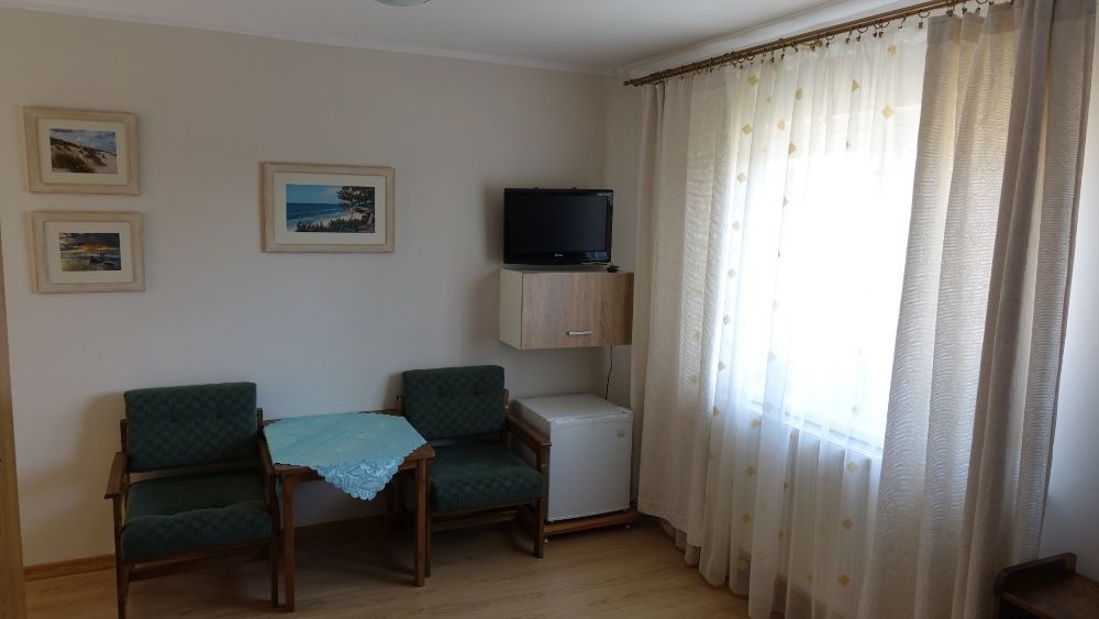 Rowy Apartamenty i pokoje gościnne Pod Dębem