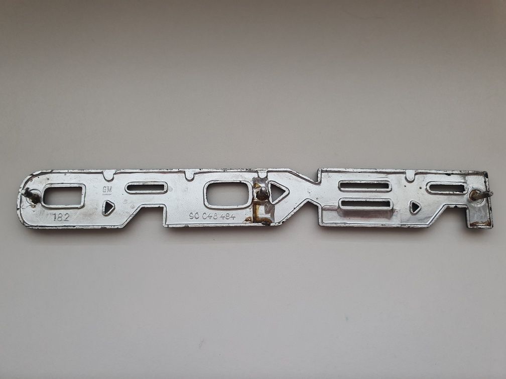 Opel Rekord emblemat napis