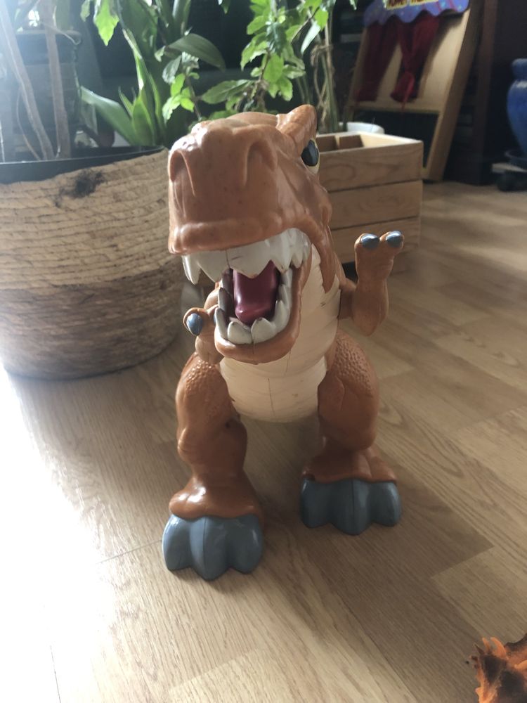 T-rex dinozaur fisher price