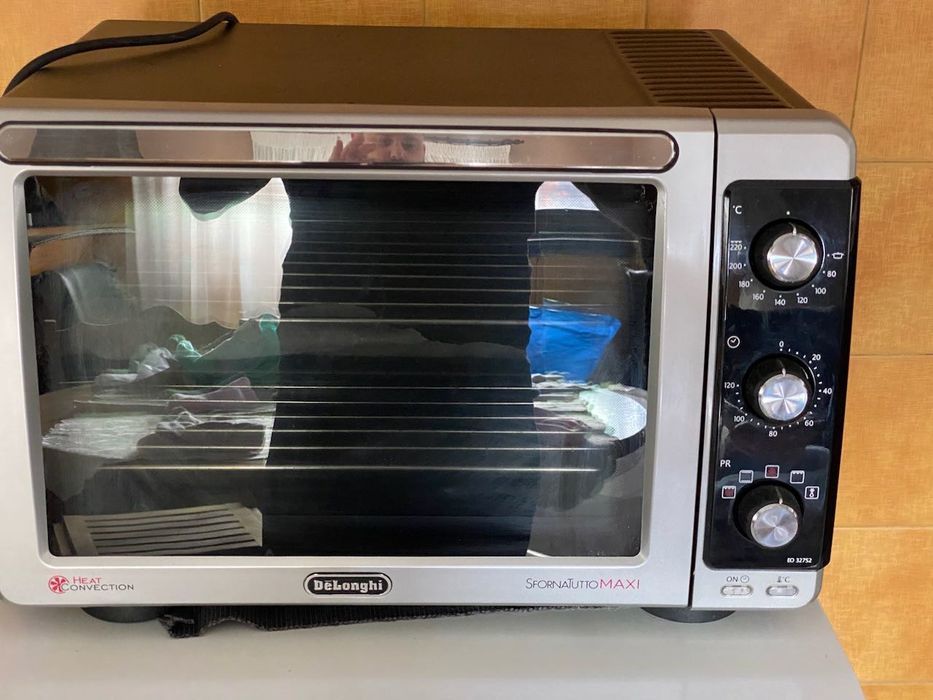 Forno portátil DeLonghi Maxi