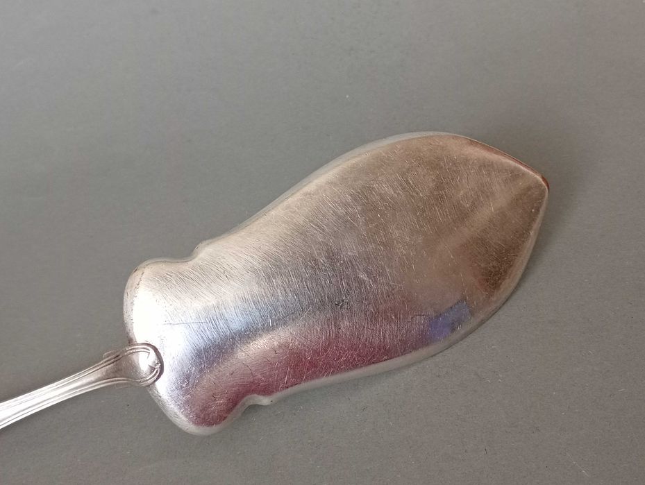 Posrebrzana łopatka do ciasta z amorkiem