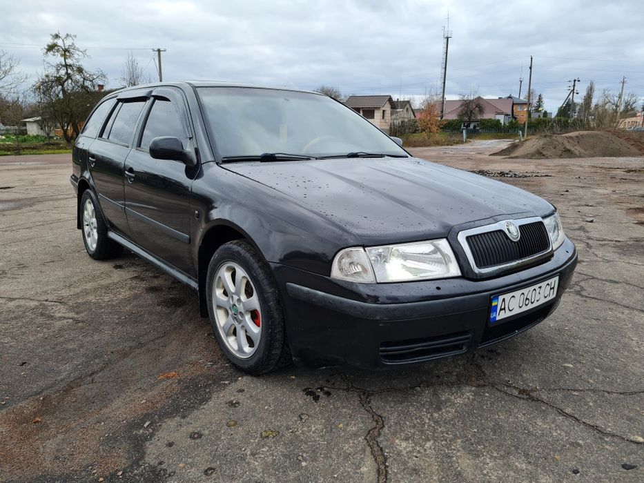 Шкода тур 1.8 бензин автомат