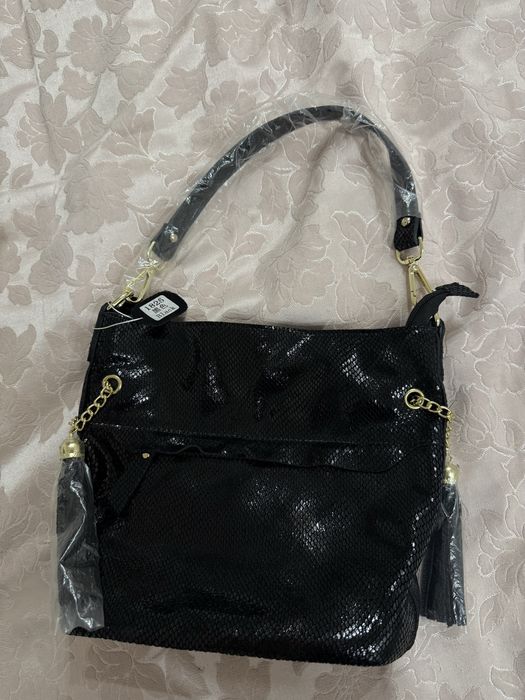 Жіноча шкіряна сумка з лазерним напиленням