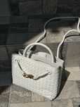 Плетена сумочка в стилі Bottega Veneta