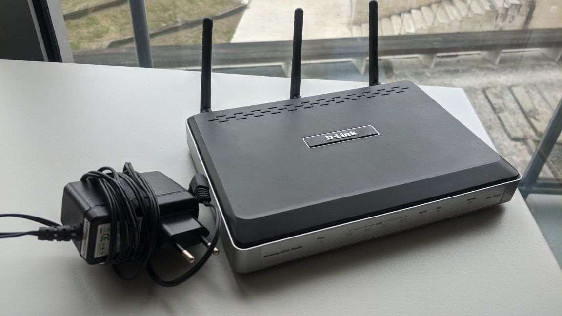 Router sem fios e modem D-Link DSL-2740B