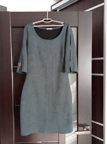 Жіноче плаття темно-зеленого кольору
