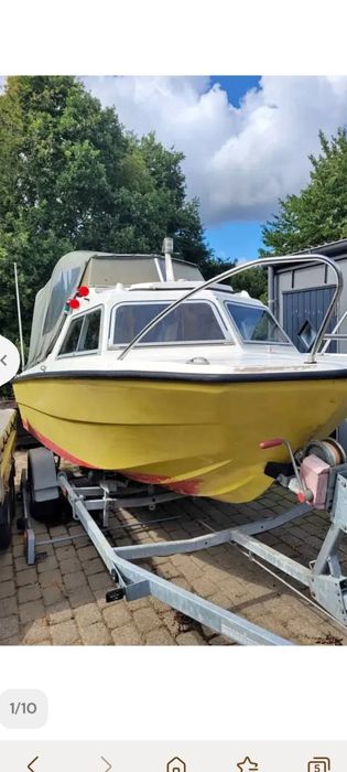 Łódka z przyczepką i silnikiem