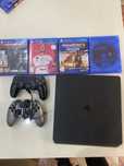 Ps4 slim 500g usada com 4 jogos e 2 comandos, processador novo!