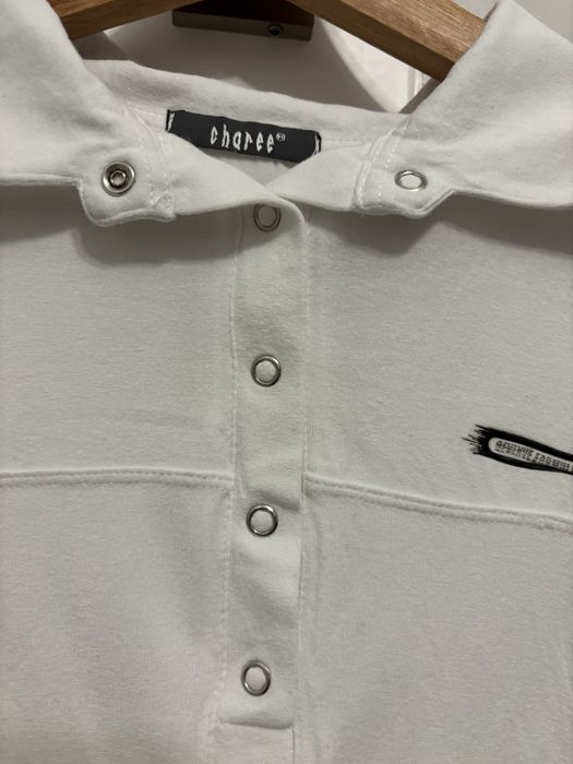 Biała bluzka sportowa polo