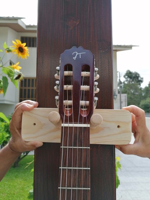 Suporte de parede para viola