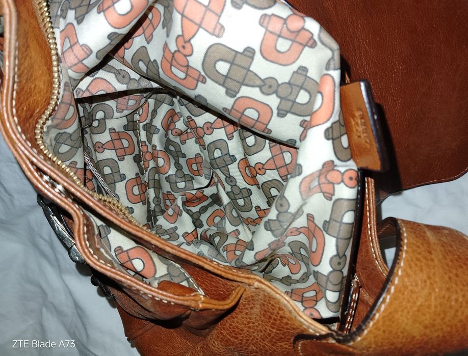 Сумочка Гуччи  в отличном  состоянии.,колекцыоная ,инклюзив.