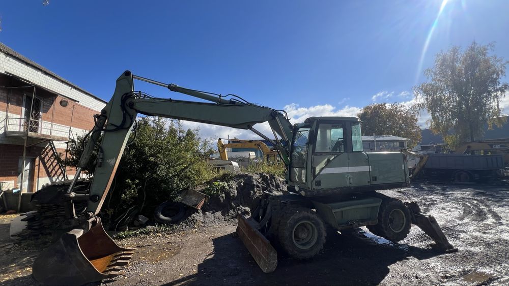 Екскаватор навантажувач VOLVO EW160P