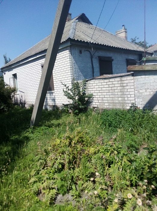 Продам половину будинка в районі Першої міської лікарні