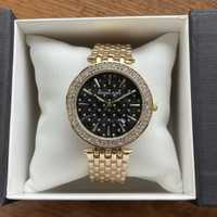 Жіночий годинник на браслеті Michael Kors золотистого кольору