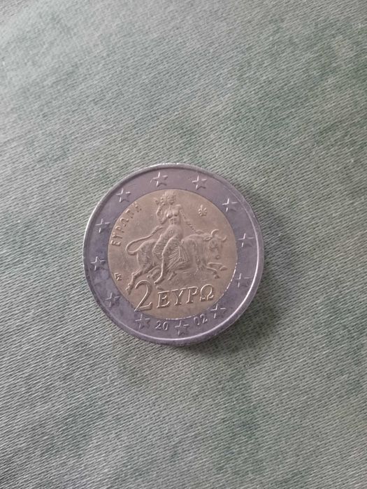 Moeda de 2 euros, 2002, Grécia: erros de gravação na roda dentada