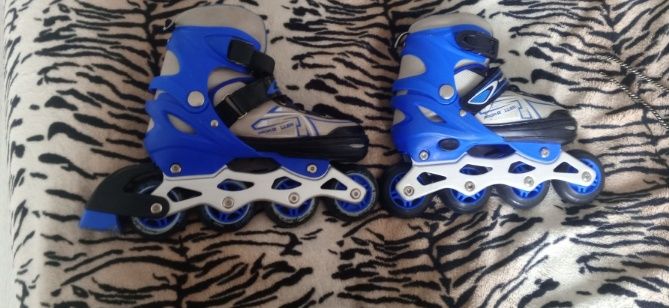 Ролики майже нові з екепіруваням