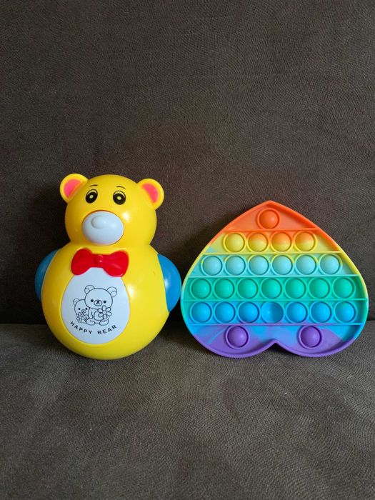 Игрушка музыкальная неваляшка и пластина анти стресс