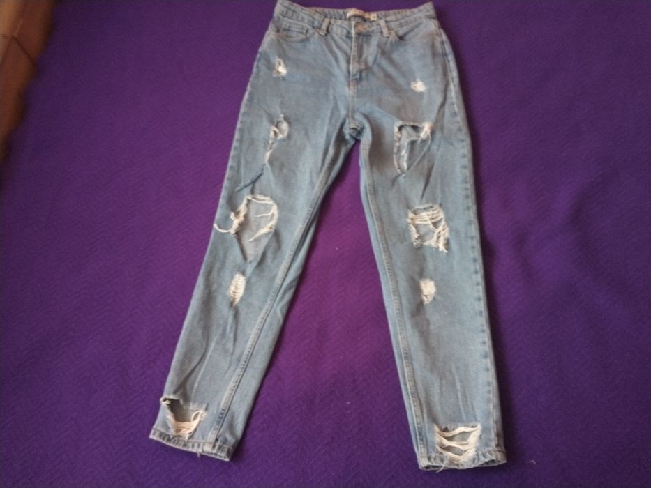 Spodnie jeansowe z dziurami i przetarciami wysoki stan Zero r. 36