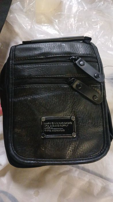 Продаж сумок та рюкзаків