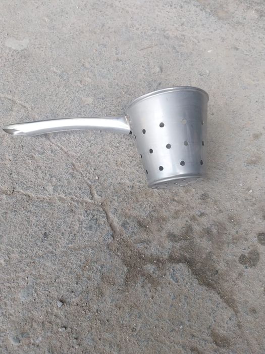 Ametolia de azeite e suporte para retirar azeitonas