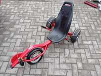 Gokart trójkołowy Dinocars jak rower poziomy