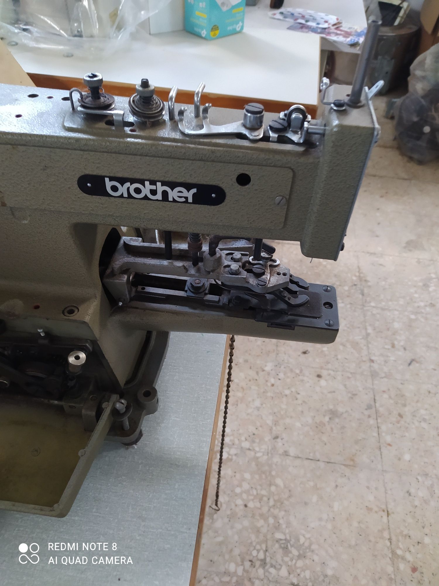 Máquina de pregar botão