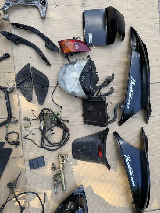 Honda Pantheon 150 owiewka lampa czujnik kiwak instalacja uchwyt wąż