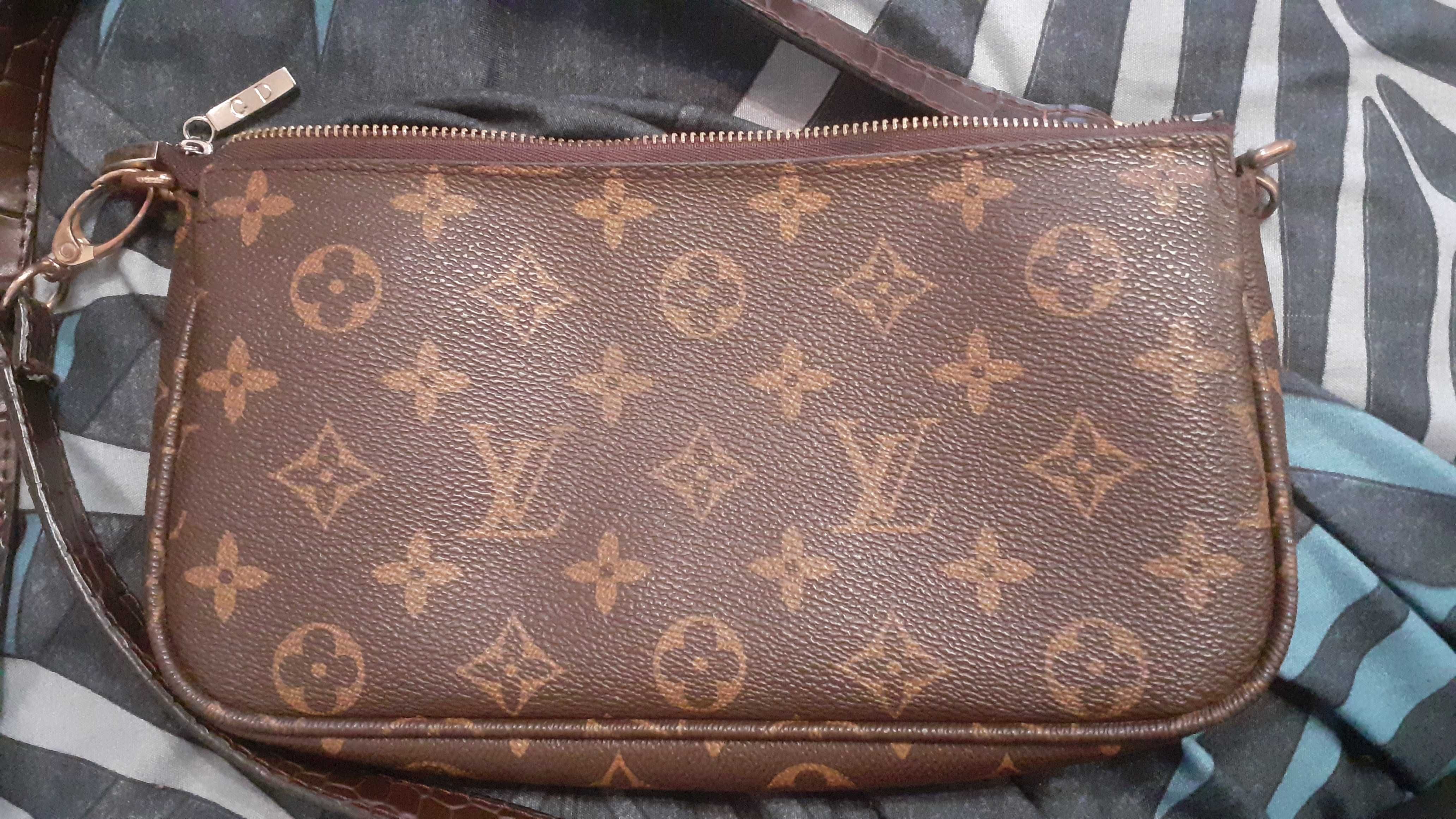 Кожаная сумка Louis Vuitton