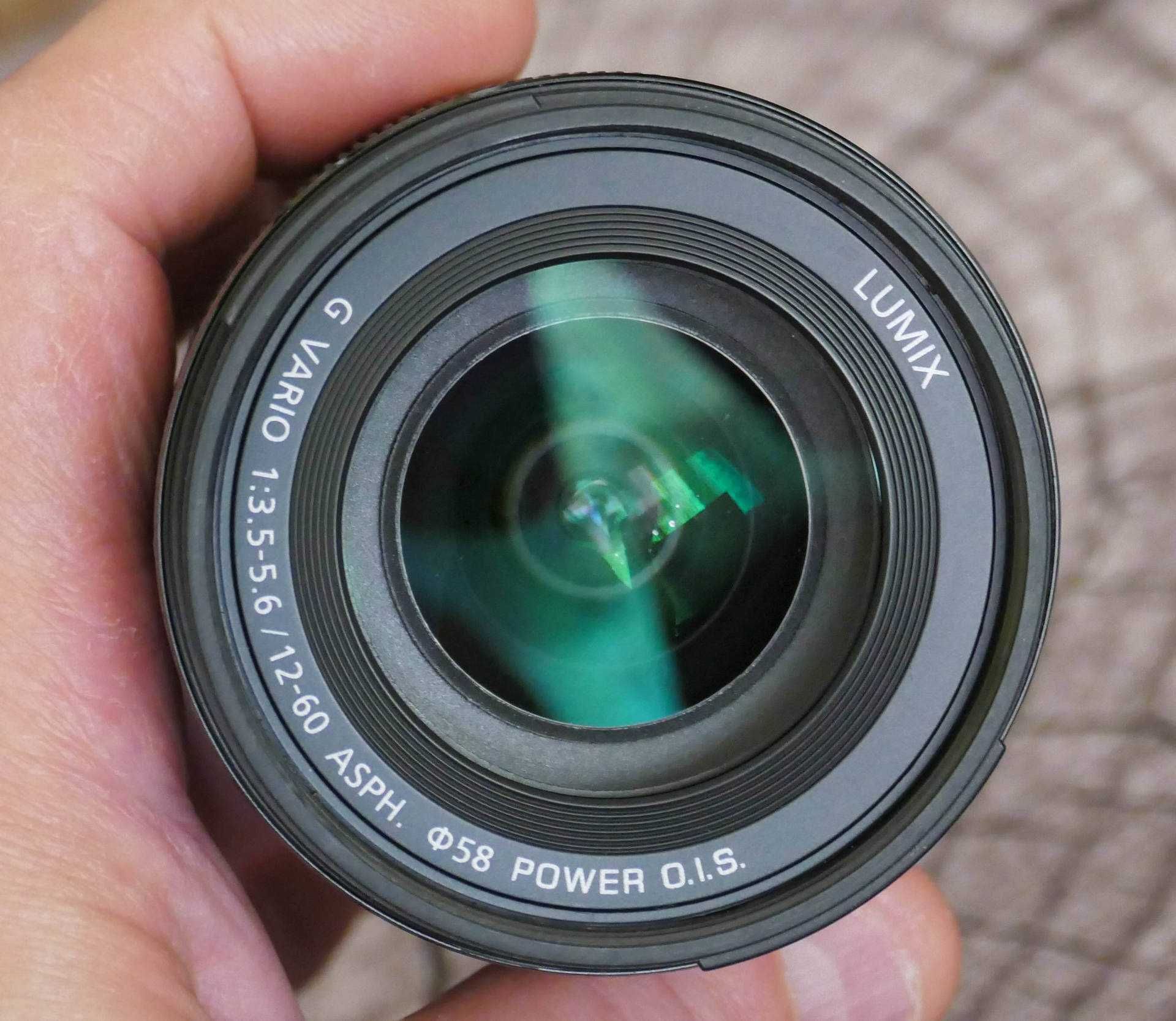 PANASONIC LUMIX DMC-GH3 z obiektywem oraz oryginalnym gripem