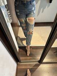 spodnie jeansowe z rozdarciami