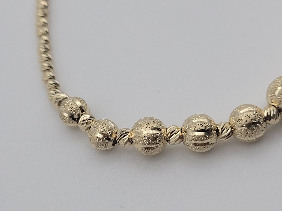 Nowa Złota bransoletka złoto próby 585, kuleczki diamentowane ocechowa