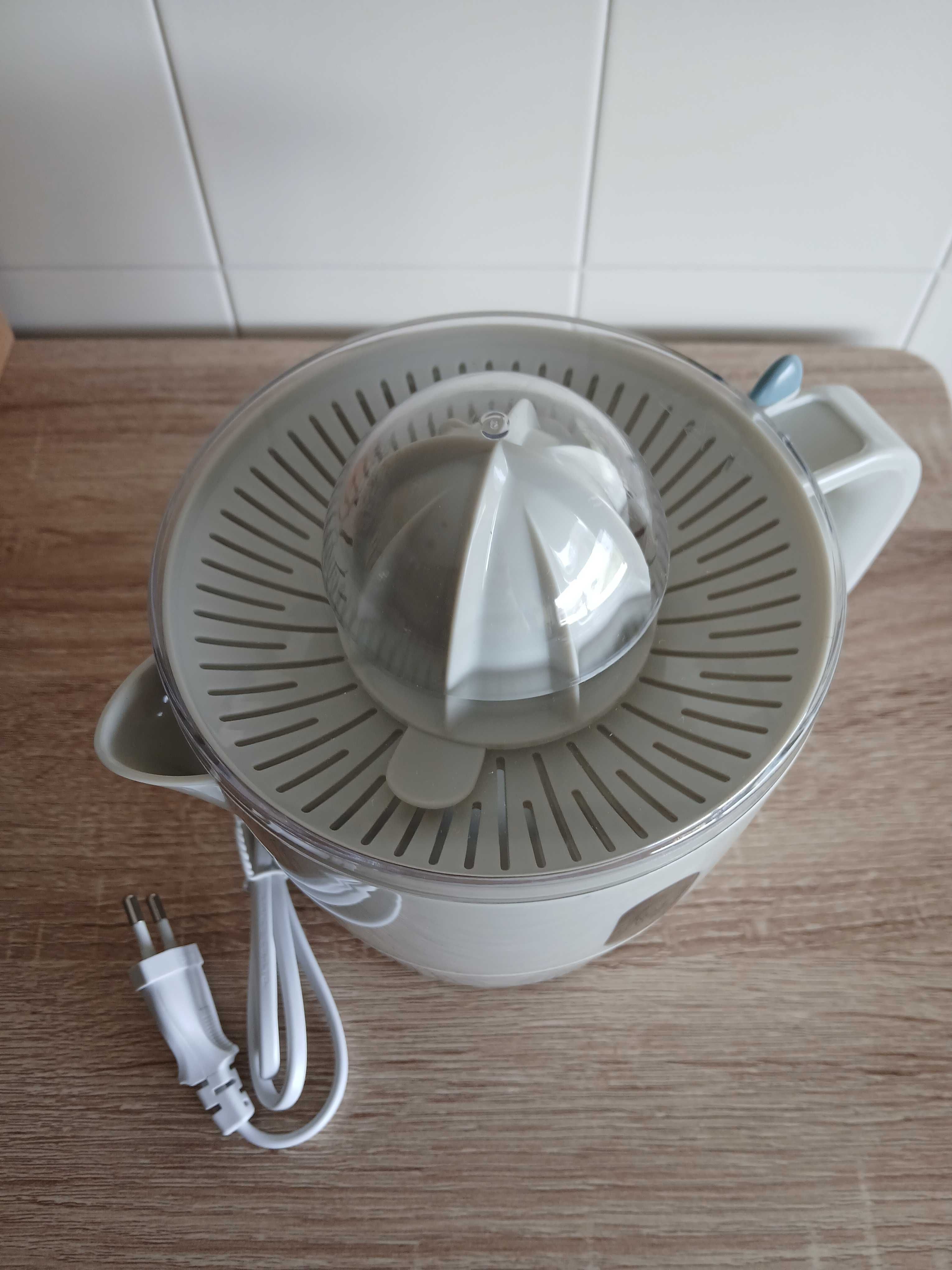 Espremedor de citrinos elétrico novo