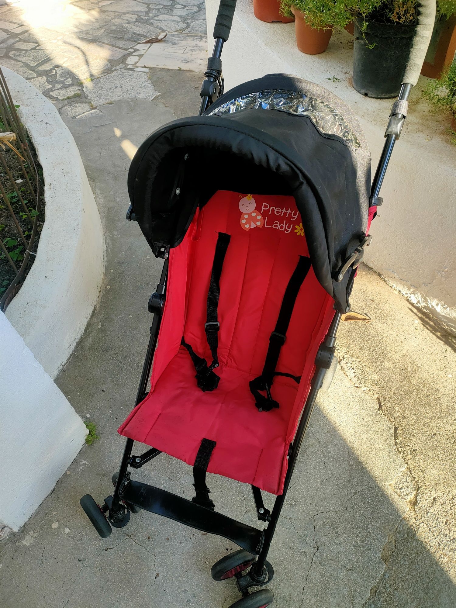 Vendo carrinho tipo bengala rosa